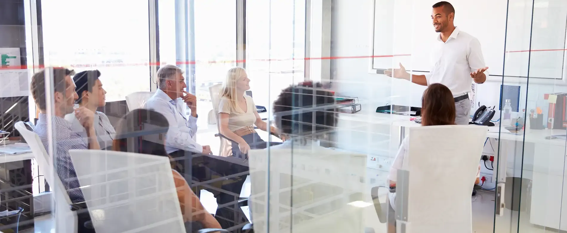 A group taking part in an office discussion